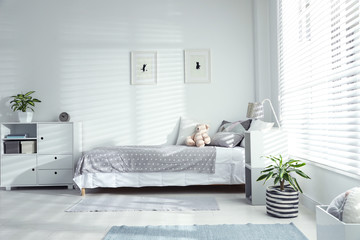 Poster - Modern child room interior with comfortable bed