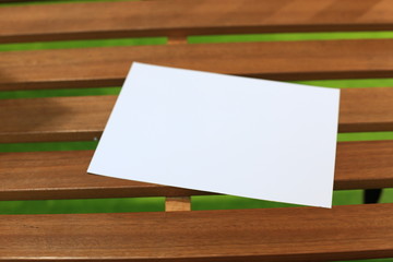 blank paper on wooden background