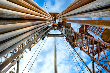 Wall Mural - Oil and Gas Drilling Rig. Oil platform isolated on white background. Drilling rig in oil field for drilled into subsurface in order to produced crude, inside view. Petroleum Industry