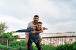 © Westend61 - Portrait of happy gay couple having fun on view terrace, Barcelona, Spain