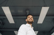 © Westend61 - Low angle portrait of confident mature businessman