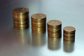 stack of coins on gray background