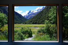 Mountain Scene Through Window