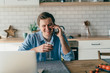 © GalakticDreamer - Smiling man phoning at home and smiling