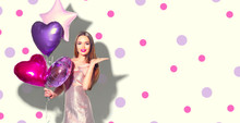 Valentine Beauty Girl With Pink Heart Shaped Air Balloons Portrait Pointing Hand, Isolated On Polka Dots Background. Beautiful Happy Young Woman Presenting Products. Holiday Party, Birthday. 