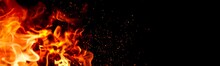 Fire Flame On Black Background. Flame Border Close Up. Sparks From Bonfire Over Dark Night Background. Christmas Backdrop, Wide Screen