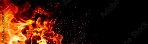 Fotomural Fire Flame on black background