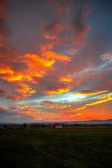 Wall Mural - Fantastic clouds on the sky at the sunset