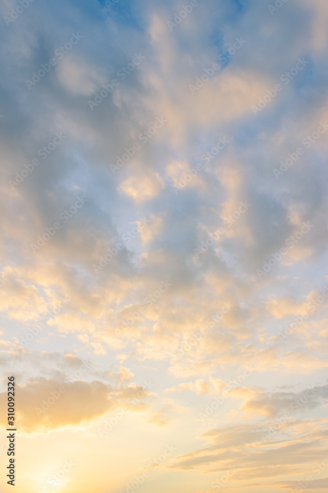 sunset sky with colorful sunshine vertical in the morning  - obrazy, fototapety, plakaty 