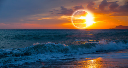 Wall Mural - Beauty sunset over the sea - Beautiful landscape with solar eclipse