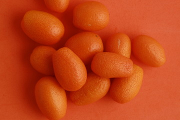 Wall Mural - small and delicious orange fruits kumquat