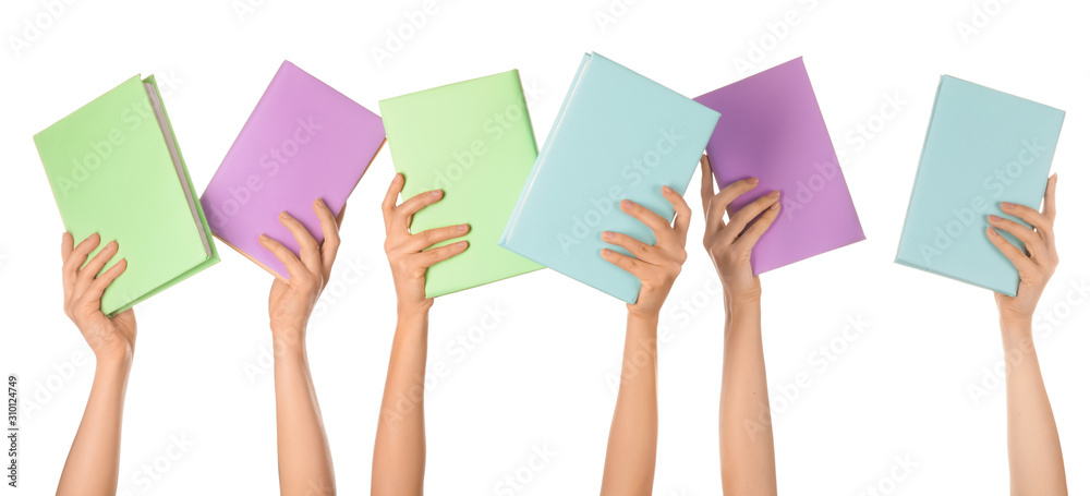 Female hands with books on white background