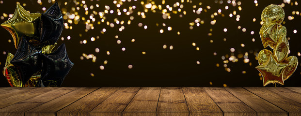 old wood background Table with fireworks and golden ballons