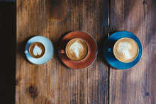 Cup Of Coffee On Wooden Background