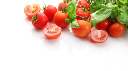 Wall Mural - Red ripe cherry tomatoes isolated on white background