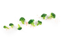 Broccoli, Many Florets, Shot From Above On A White Background With Salt And A Place For Text