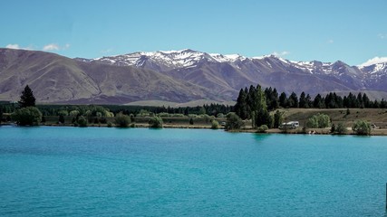 Naklejka na meble Glacier Lake View with background of snowy Mount Cook on a sunny day