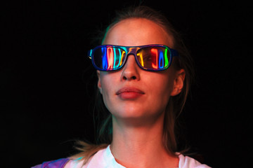 Wall Mural - Image of young woman in 3D glasses watching movie in dark cinema room