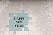 © MuhammadFadhli - Happy New Year wordings with puzzle pieces