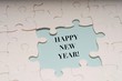 © MuhammadFadhli - Happy New Year wordings with puzzle pieces