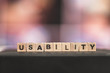 Usability concept: Close up picture of wood cubes with the word “usability”