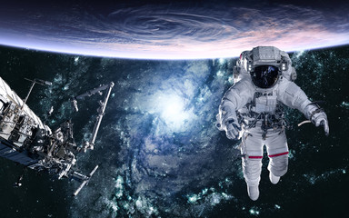 Wall Mural - astronaut, planet, space station on blue galaxy background. science fiction. elements of this image 