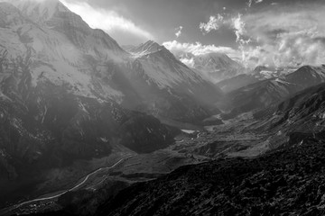 Wall Mural - Black and white misty mountains. Marsyangdi mountain river valley. Morning in Himalayas, Nepal, Annapurna conservation area