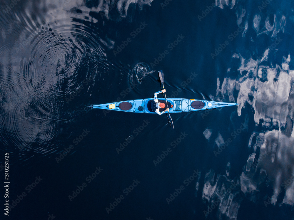 Blue kayak with man sea, open space, aerial top view - obrazy, fototapety, plakaty 