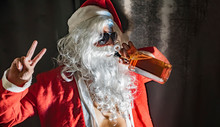  Bad Santa Man Portrait At Dark Room, Santa Claus With A Bottle Of Whisky Enjoying A Drink