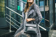 © mary_markevich - stylish woman in winter fur coat walking in street