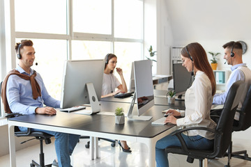 Sticker - Team of technical support agents working in office