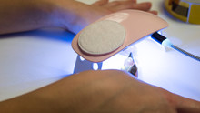 Hybrid Manicure, Uv Lamp, Nail Plate Curing. Beauty Salon, Manicure, Woman At The Beautician