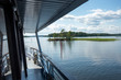 Beautiful view from the deck of the cruise ship going up the Lake Saimaa, Lappeenranta, Finland on a warm sunny day.
