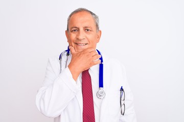 Poster - Senior grey-haired doctor man wearing stethoscope standing over isolated white background looking confident at the camera smiling with crossed arms and hand raised on chin. Thinking positive.