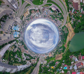 Wall Mural - Abstract aerial view of old and new buildings with blue sky in the center in the city with a lot of cars. Russian streets, Novosibirsk.