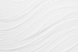 © finepoints - White liquid striped paint texture with smooth diagonal waves as simple abstract background.