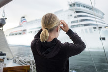 Woman Looking At Cruise Ship