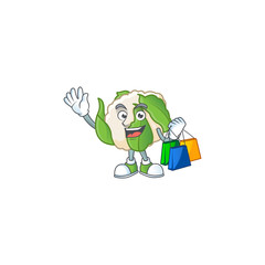 Sticker - Cheerful cauliflower mascot waving and holding Shopping bags