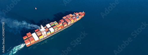 Cuadros en Lienzo Aerial drone photo of industrial cargo container carrier cruising the open ocean