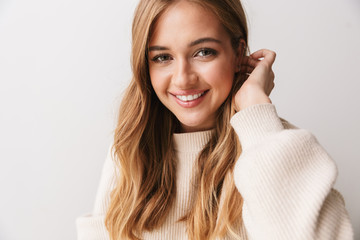 Sticker - Image closeup of pleased young woman smiling and looking at camera