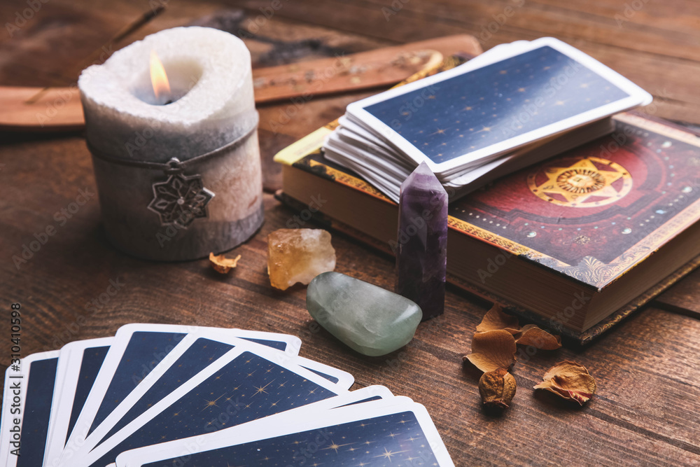 Fortune-telling tarot cards and magic accessories - obrazy, fototapety, plakaty 