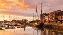 Tall Ship Harboured At Plymouth Barbican At Sunrise In Amazing Light