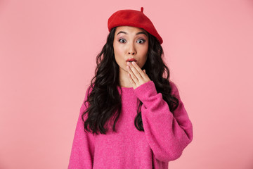 Canvas Print - Image of surprised beautiful asian girl with long dark hair expressing fright