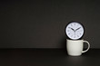 © safriibrahim - Break Time Coffee cup with clock concept