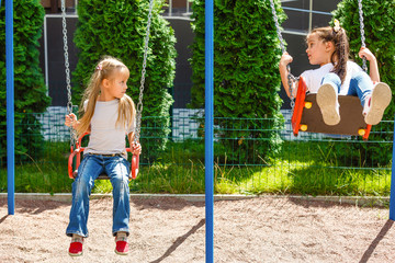 two little girls on the playground