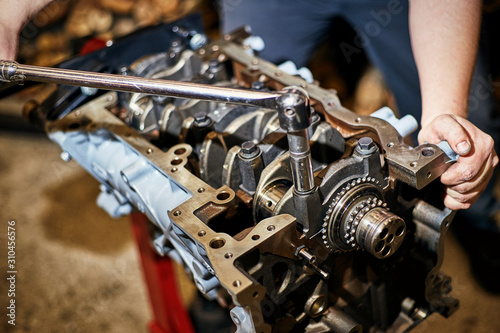 Fotomural Automotive four-cylinder engine water cooling during repair.
