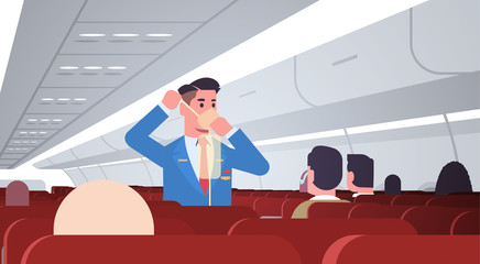 Wall Mural - steward explaining for passengers how to use oxygen mask in emergency situation male flight attendant safety demonstration concept modern airplane board interior horizontal vector illustration