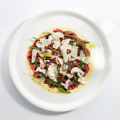 Wall Mural - Beef Carpaccio with Mushrooms, Parmesan and Fragrant Oil