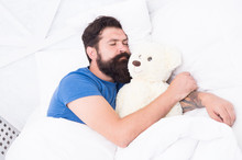 Sweet Dreams. Bearded Hipster Play Toy. Valentines Day Gift. Man Sleep Hug Soft Toy Relaxing In Bed. Cute Teddy Bear Toy. Softness Tenderness. Playful Adult Fall Asleep. Good Night. Sleep Well