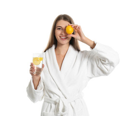 Wall Mural - Young woman with glass of lemon water on white background